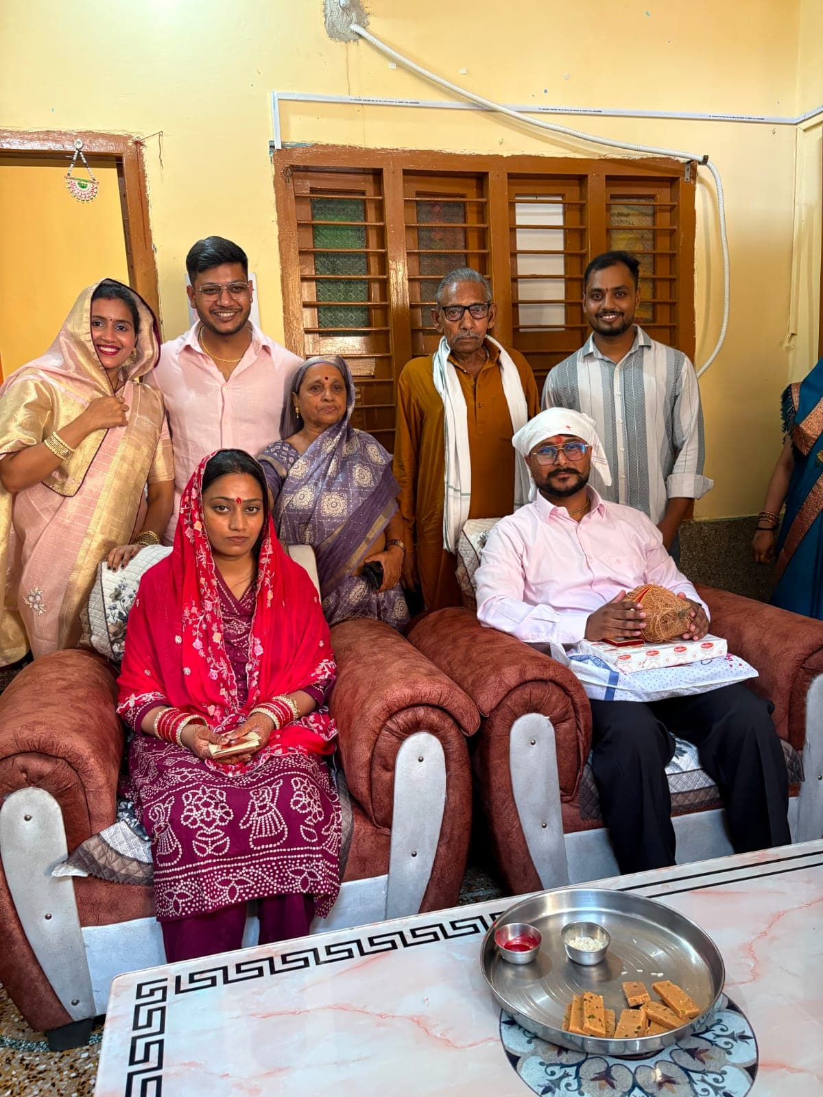 Dada-Dadi's quiet blessings, Pratyaksh and Suman's warm smiles — a frame that held the whole family's love.